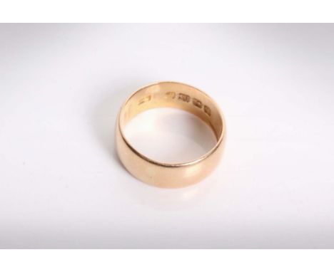 An 18ct gold wedding band. 5.5g size K.