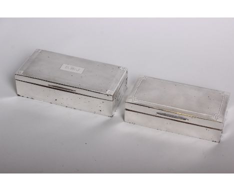 A silver cigar box, Birmingham, 1937, with engine turned lid 17cm wide, together with another cigar box, Birmingham, 1947 als