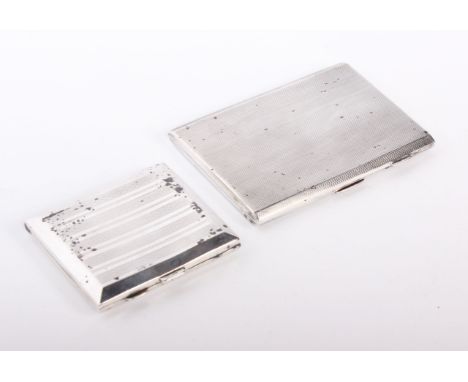 A silver cigarette case, E J Houlston, Birmingham, 1945, engine turned, 13cm wide, together with another similar cigarette ca