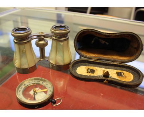 A pair of mother of pearl opera glasses and a compass (2)