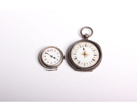 A Silver pocket watch with Swiss marks stamped 0.935. Gold and enamel white 34mm face with gilt highlights and Roman numeral 