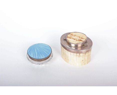 A  sterling silver mounted ivory tea caddy. London 1881 together with a cut glass sterling silver pot with blue guilloche ena