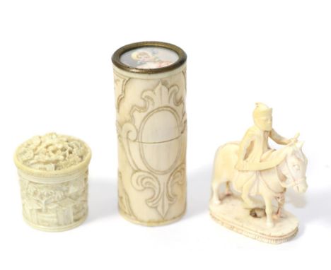 A Victorian ivory cased scent bottle with painted miniature top; a small Chinese late 19th century circular carved ivory box;