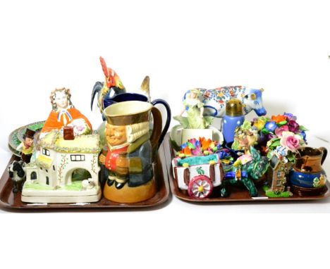 Two trays of decorative ceramics including a Royal Doulton jug, Toby jug, Beswick, Staffordshire groups, later decorated 18th