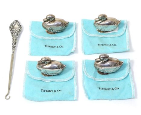 A set of four Tiffany sterling salt and pepperette ducks, stamped and boxed; together with a silver button hook (5)
