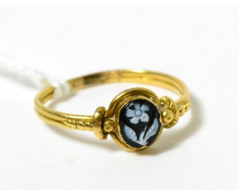 A mourning ring, finger size L, shank misshapen 2.35g gross 