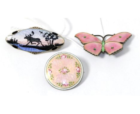 An enamel brooch by Elvik & Co, an enamel butterfly brooch and another enamel brooch (3)