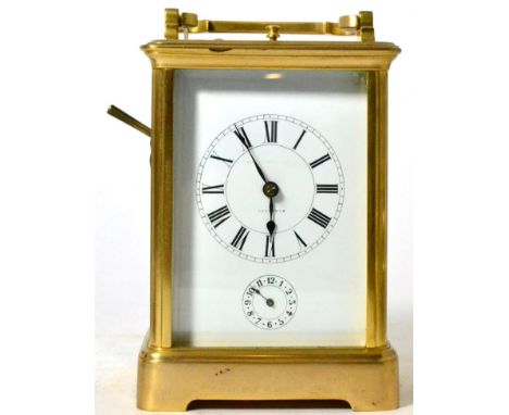 A brass striking and repeating carriage clock 
