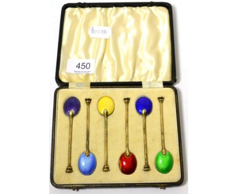 A cased set of silver and enamel seal top spoons