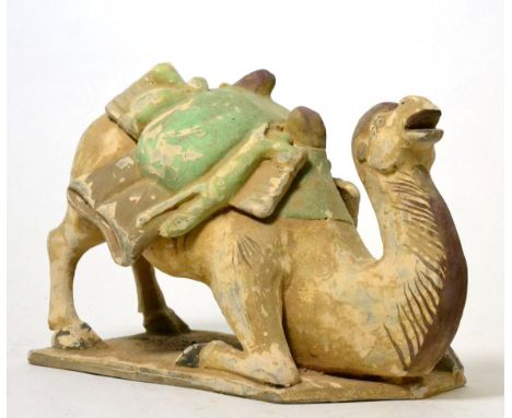 A Chinese terracotta model of a seated camel, 19th century 