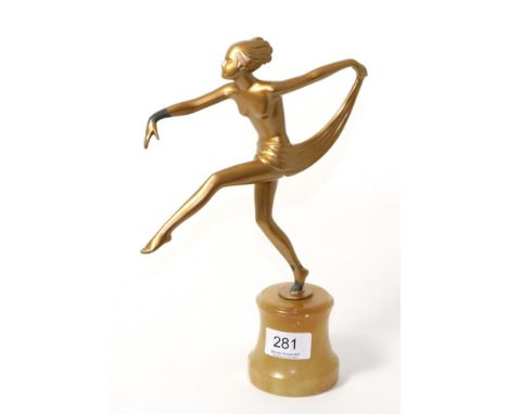 Art Deco spelter figure modelled as a semi-nude dancer, in the manner of Lorenzl, on an alabaster base (a.f)