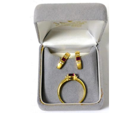 A ruby and diamond ring and earring set Finger size Q, 7.8g gross