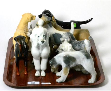 Seven Royal Copenhagen porcelain models of dogs; together with three Beswick Dogs: Labrador ''Solomon of Wendover'', model No