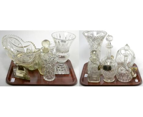 A group of cut glass decanters and vases, with a set of four silver decanter labels and two silver napkin rings 