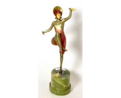 Art Deco spelter and cold painted figure modelled as a dancer, in the manner of Lorenzl, on a green onyx base (a.f)