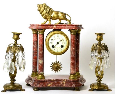 Red marble portico striking mantel clock and a pair of lustres 