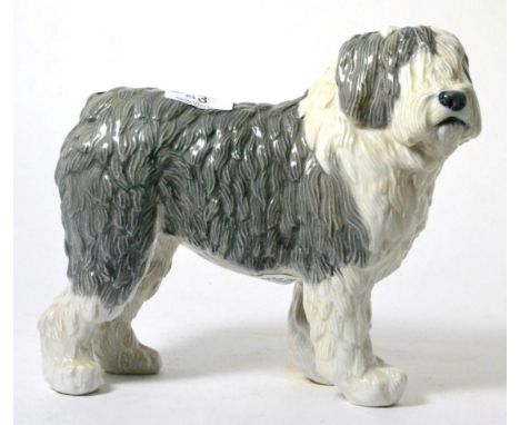 A large Royal Copenhagen porcelain model of an Old English sheepdogIn good condition