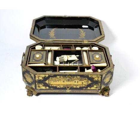 A 19th century lacquered sewing box with ivory fitments Rubbing to the gilding on the box cover, otherwise appears in good or