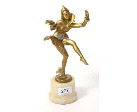 Art Deco spelter figure modelled as a harlequin pixi, in the manner of Lorenzl, on an alabaster base (a.f)