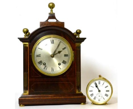 A quarter striking mantel clock and a small striking brass timepiece, the dial signed Wilson & Sharpe
