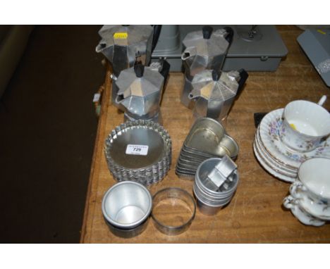 A quantity of Art Deco design coffee pots; together with various metal moulds