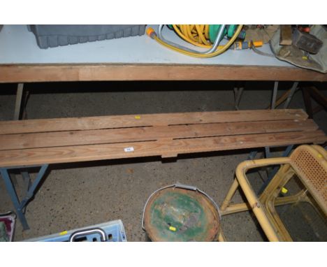 A pine folding bench