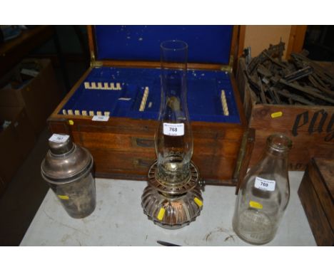 A glass oil lamp