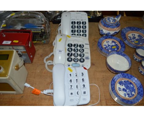 Three big button telephones