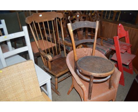 A stick back rocking chair together with a Loom armchair and a Bentwood chair