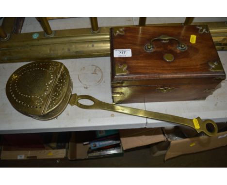 A brass mounted tea caddy together with a brass strainer
