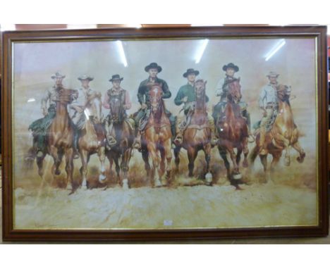 A large Magnificent Seven print, framed 