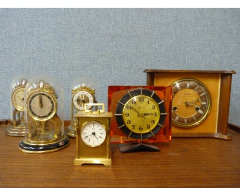 A mid 20th Century Smiths mantel clock, three small anniversary clocks, another mantel clock and a small brass carriage clock