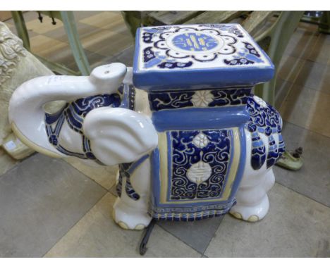 A ceramic elephant garden seat