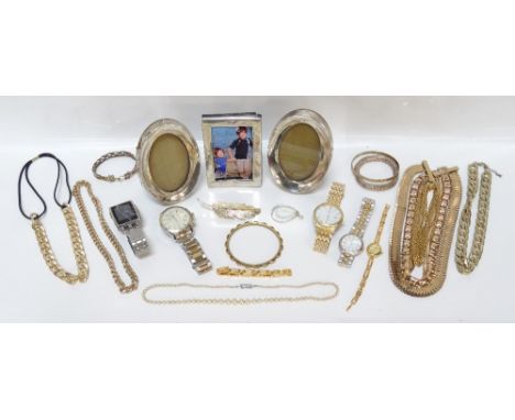 THREE SMALL VINTAGE SILVER PHOTOGRAPH FRAMEStogether with a small collection of costume jewellery and wristwatches (From the 