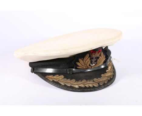 British Naval uniform, a Royal Navy "summer" peaked cap with white top for the rank of Commodore, Captain and Commander, havi
