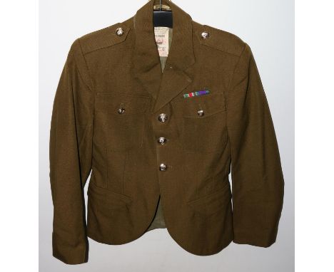 British Army uniform, a khaki green jacket with A Grantham Ltd label "HOSKINS" having Gaunt of London Highland Light Infantry