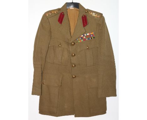 British Army uniform, a British Army khaki green jacket with label "H F HUMFREYS" having Firmin of London GRVI brass buttons,