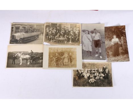 Two albums containing approximately 160 including Salvation Army Band group, vehicles, horse and carriage, bicycles, portrait