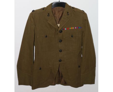 British Army uniform, a khaki green jacket with Farrell and sons Ltd of Camberley label "J M H SCOTT" having Firmin of London