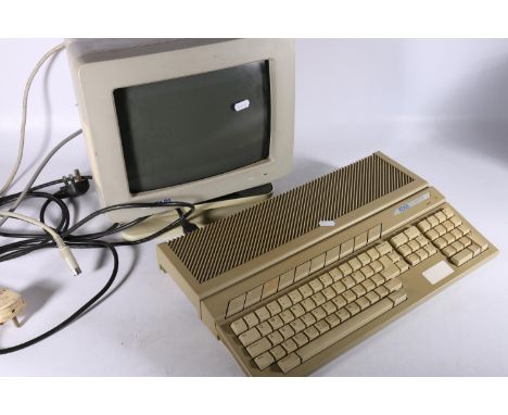 Vintage Atari personal computer hardware including SC1435 monitor boxed, SM124 monitor, 520ST console boxes, 520ST console, 1