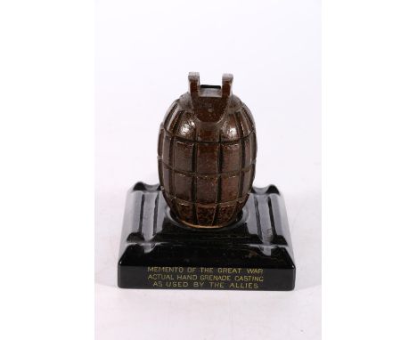 WW1 Mounted “Hand Grenade Casting” Inkwell with original inkwell inside, ceramic plinth states “Memento of the Great War, Act