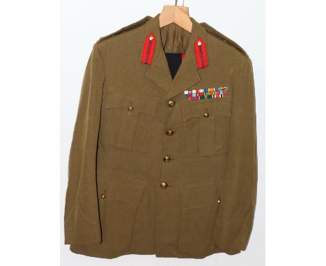 British Army uniform, a British Army khaki green jacket with Jennings and Gully Ltd label "MAJOR C L OVERTON RA 394/40" havin