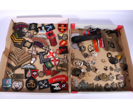 Military cap badges including SDG Glengarry Fencibles, Edinburgh University Training Corps, OV badge by Aksel Holmsen of Oslo