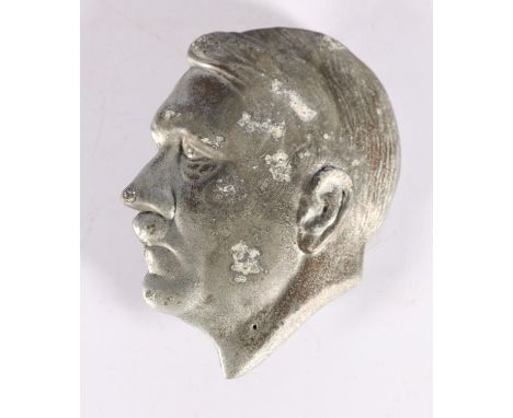 An unusual Adolph Hitler portrait helmet plate or wall plaque, 11cm 