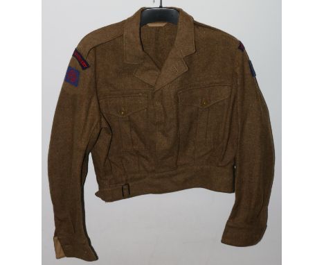 British Army uniform, a British Army khaki green battledress jacket with Abbey Clothing Company Ltd label "Battledress blouse