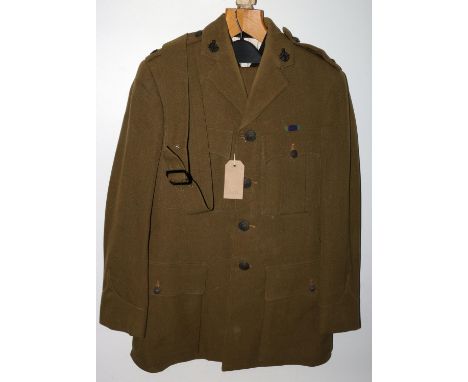 British Army uniform, a British Army Chaplain's khaki green jacket with R E City of London label having black buttons, IN THI