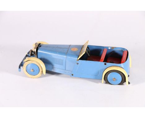 An early Meccano Ltd of Liverpool clockwork model of a sports car, 21cm long 