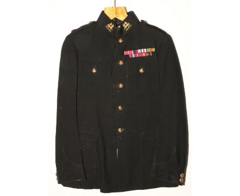 British Army uniform, a British Army dark blue jacket with Flights Ltd of London label "4060L 20-12-38 2/Lt T F POOLE 4/2nd" 