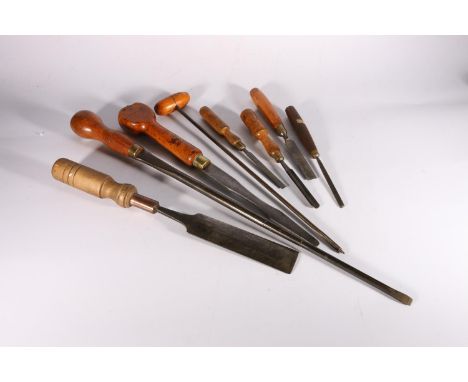 Old tools including a Marples &amp; Son 18 inch lathe chisel, an unnamed 26 inch long chisel, a James Howarth gouge with 1 3/