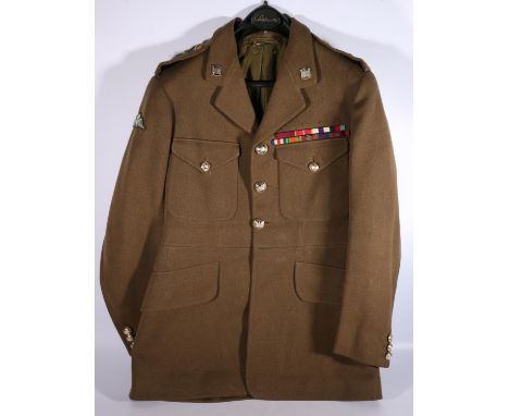 British Army uniform, a British Army khaki green jacket with Jones Chalk and Dawson Ltd of London label having 5th Royal Inni